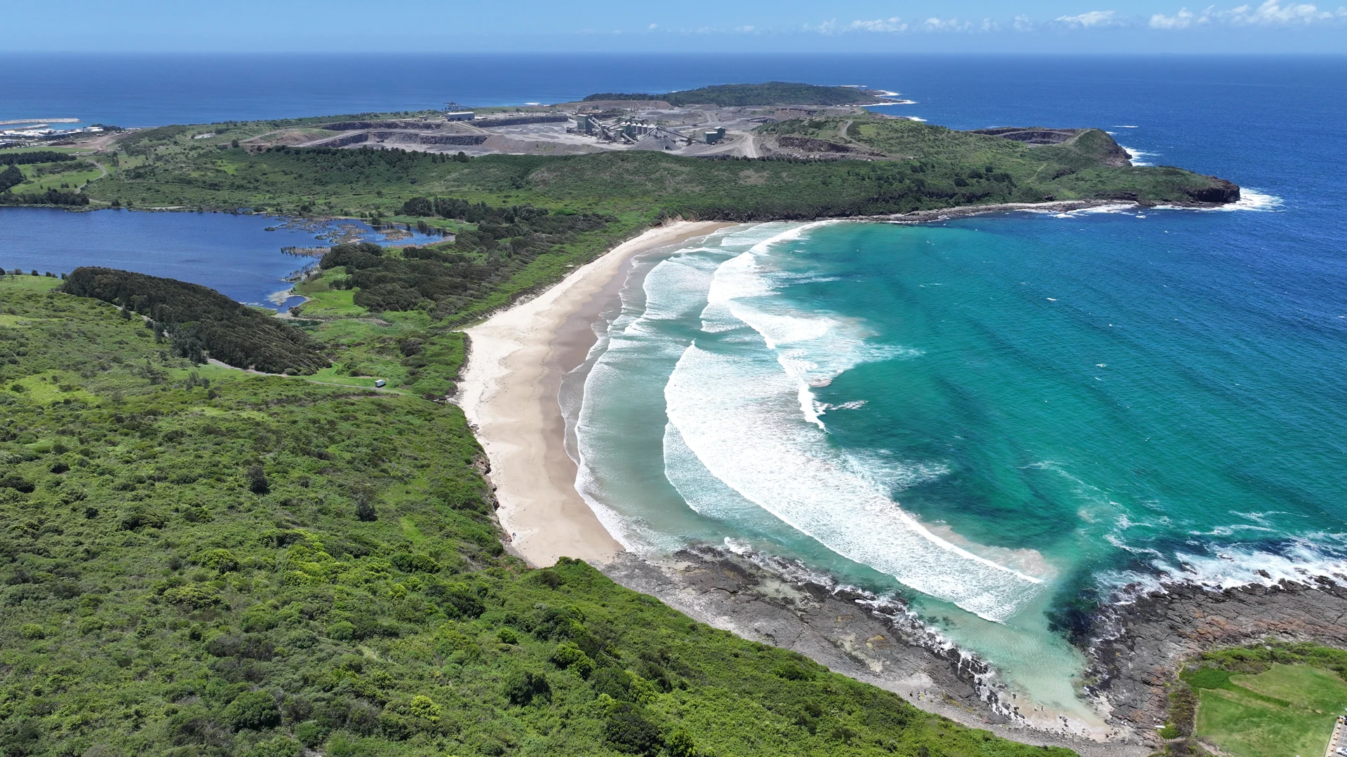 Narayan’s aerial photograph of a sweeping beach, turquoise surf and green headland